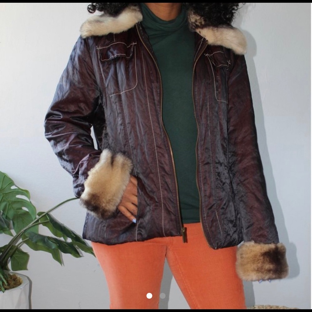 Burgundy coat with cheetah print interior.